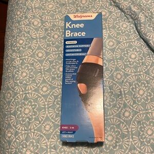 Brand new knee brace still in box never been opened